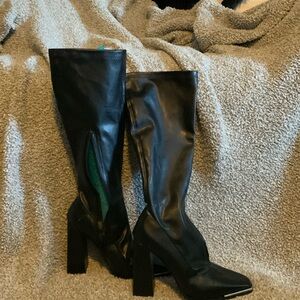 Black boots. Never worn